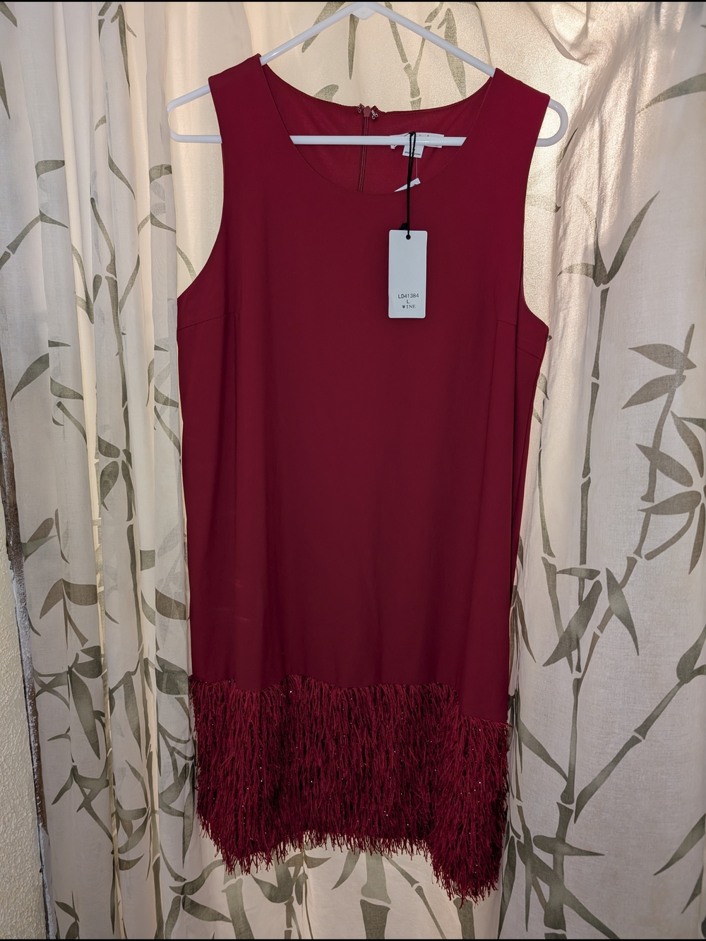 Sleeveless Fringe Hem Mini Dress in Wine Red